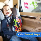 Child playing with suction cup bath toys on tiles