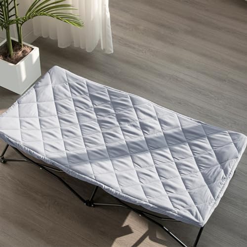 Side angle view of the grey Biloban padded travel bed sheet highlighting its quilted cushioning thickness.