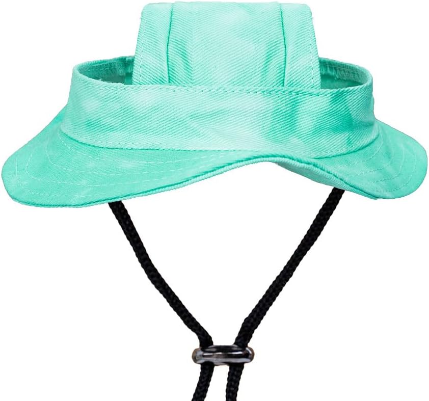 Bright pink GDQ pet sun hat displayed on a flat surface