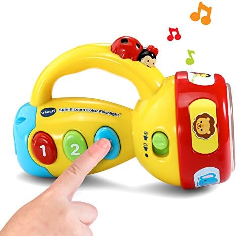 VTech educational flashlight projecting a colorful beam to demonstrate color recognition features
