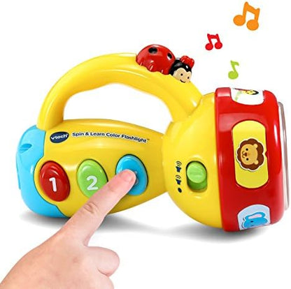 VTech educational flashlight projecting a colorful beam to demonstrate color recognition features