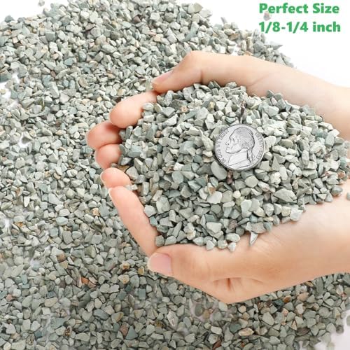 Green zeolite rocks used as decorative vase filler.