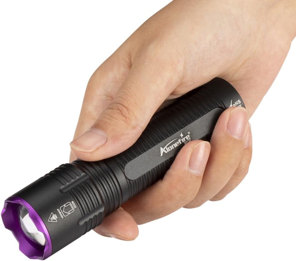 Side view of the lightweight Alonefire SV137 digital display black light showing the 4-core LED head.