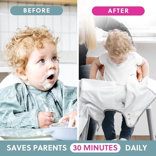 Infant wearing the soft stain resistant BIBaDO sleeve bib during a messy baby led weaning session