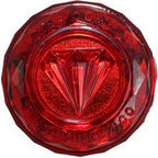 Diamante spinning top showing internal string storage feature