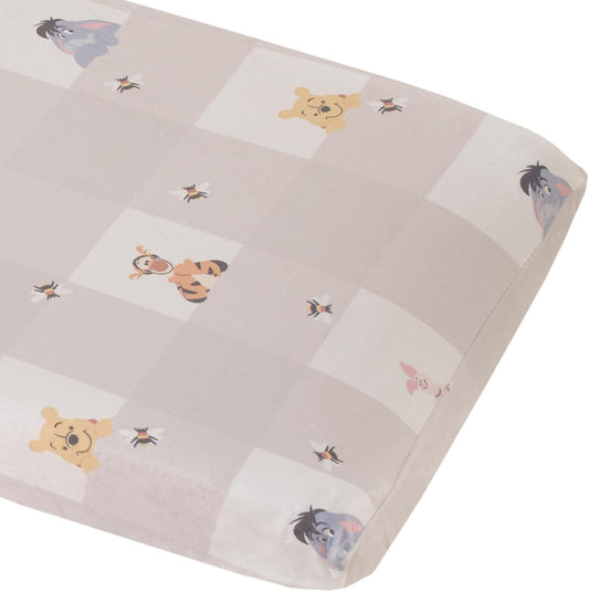 NoJo Disney Winnie the Pooh changing pad cover front view showing grey and white plaid pattern.