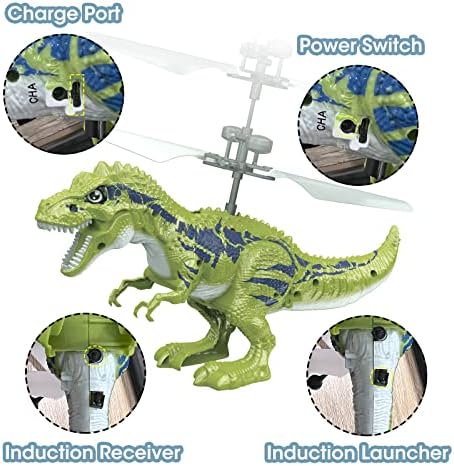 Hand operated flying dinosaur toy hovering mid air above a child hands showing safety rotors.
