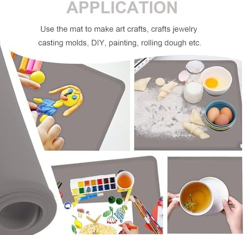 Four pack of gray flexible silicone baby placemats laid out flat on a dining table