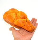 Oversized 7.9 inch yellow bread sensory foam toy squeezed flat
