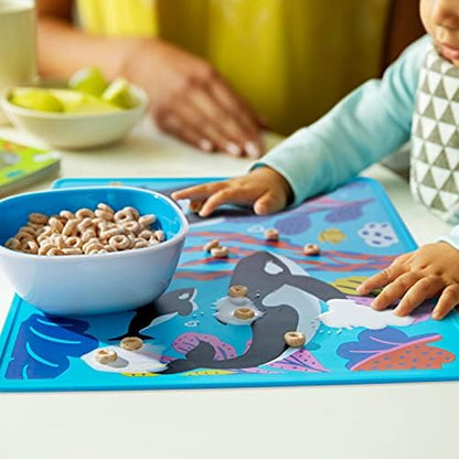 Munchkin WildLove orca placemat showing the detailed raised edge designed to contain food and liquid spills