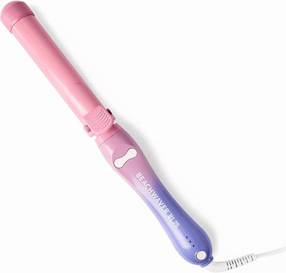 The Beachwaver Co. B1.25 Rotating Curling Iron Pink Sunset front view showing the ceramic barrel and dual rotation arrow buttons.