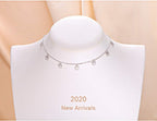 Detailed shot of the high-polish rhodium plated rolo chain showcasing the 1.5 mm width and cubic zirconia stones.