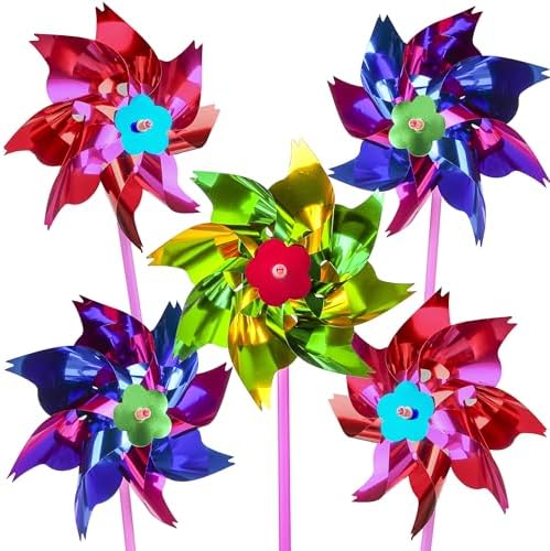Bright metallic rainbow pinwheels in a garden setting