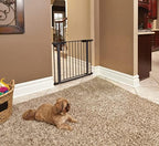 MidWest steel dog gate showing close-up of the spring-loaded one-handed latch mechanism.