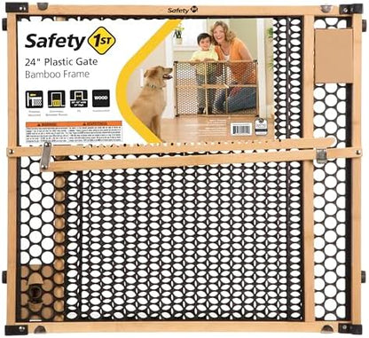 Sturdy pressure fit dog barrier blocking entry to a hallway to keep domestic pets safe.
