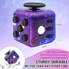 Close up of the rainbow colored six sided fidget cube highlighting the tactile buttons and joystick.