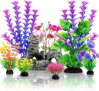 Multi-sized plastic aquarium decorations showing weighted pedestals for underwater stability.