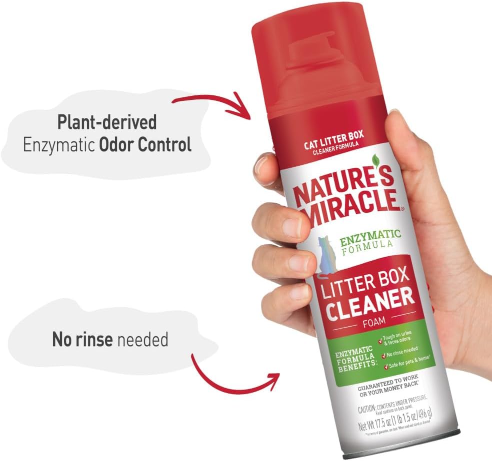 Nature's Miracle enzymatic formula litter pan spray being applied to an empty cat box