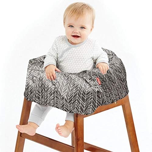 Skip Hop take cover folded compactly into its built in storage pouch