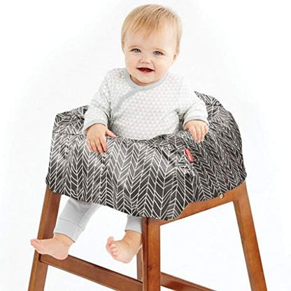 Skip Hop take cover folded compactly into its built in storage pouch