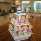Gyufise party cupcake toppers inserted into birthday dessert