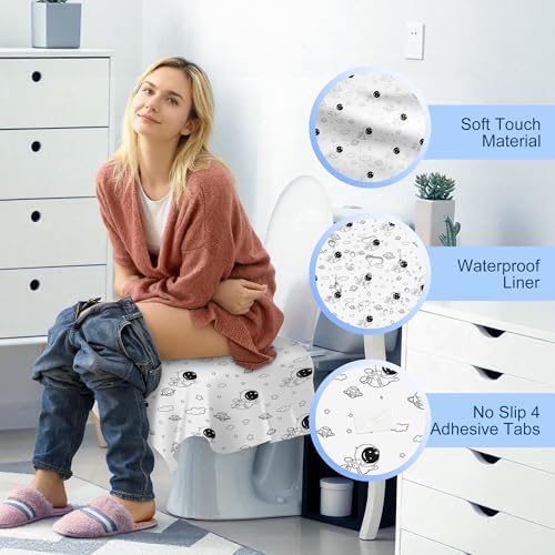 Toddler potty training toilet protectors featuring blue cartoon space exploration patterns.