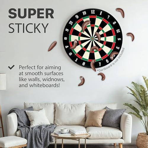 Stretchy poop emoji slingshot toys being launched from a finger for indoor flying games.