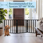 Angled view of the Petmaker black freestanding pet gate showing the stable zigzag configuration.