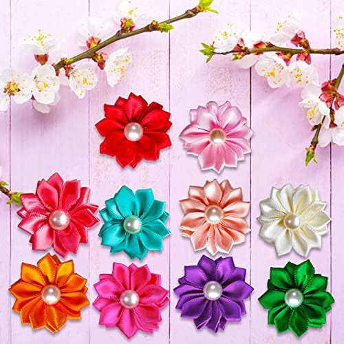 Small puppy with Mruq Pet flower hair bow on topknot
