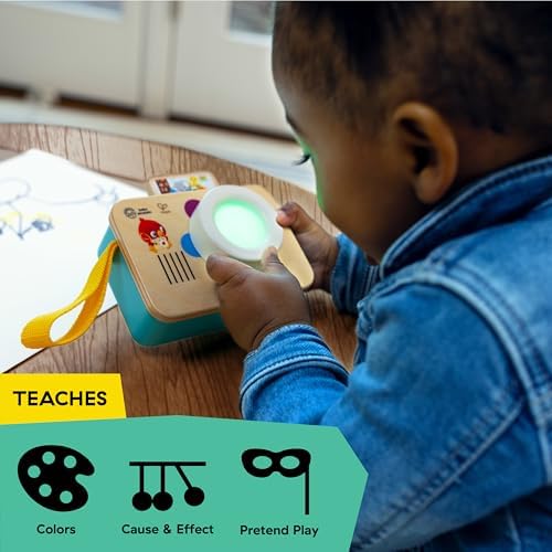 Baby Einstein Hape pretend play camera showcasing the twisting color lens and retro aesthetic