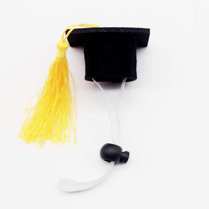 Two pack mini graduation caps utilized as creative party wine bottle decorations
