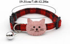 Adjustable blue tartan pet neck strap with secure plastic buckle closure