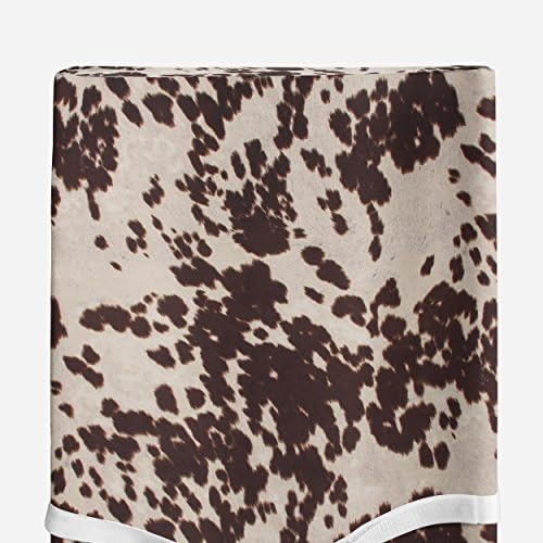 Close up view of the super soft brown and white cow spot fabric texture from Sweet Potatoes.