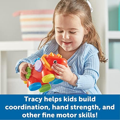 Bright orange and yellow dinosaur sensory toy showing twisting clicky feet features