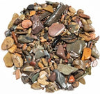 Natural mixed color polished river rocks close up