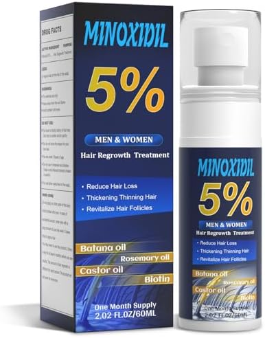 Extra strength hair regrowth treatment bottle showing biotin and batana ingredients