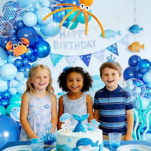 JOYFLOAT dark blue and metallic blue balloon columns created for an indoor marine themed celebration