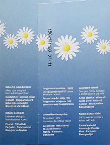 Side view of Natracare Ultra Pads packaging highlighting chlorine-free and vegan features.