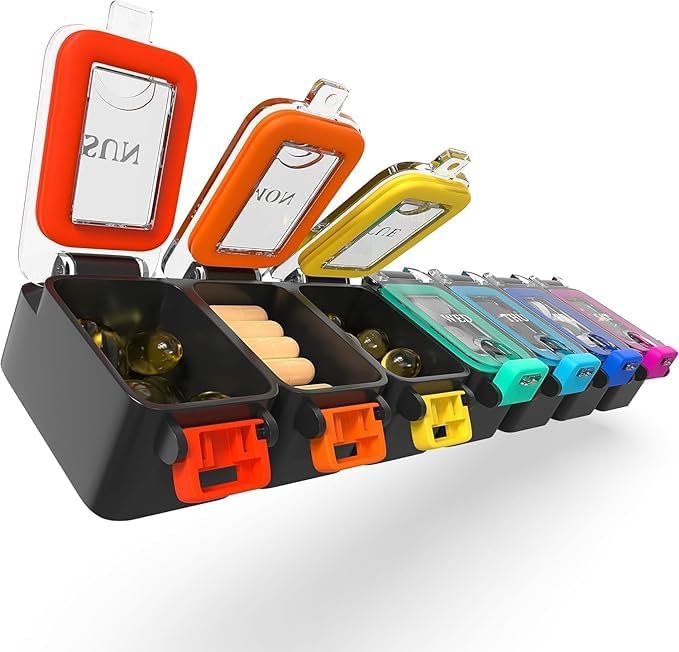 BEXEEN weekly pill organizer front view showcasing the 7 day colored compartments