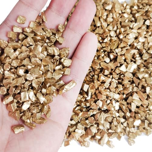 Close up view of metallic gold crushed glass granules