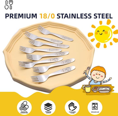 Toddler hands holding stainless steel safety fork
