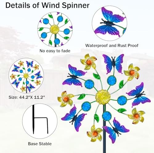 Close up of colorful metal butterfly design on garden windmill