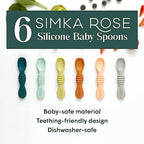 Multicolor silicone spoons for baby led weaning arranged on a tabletop