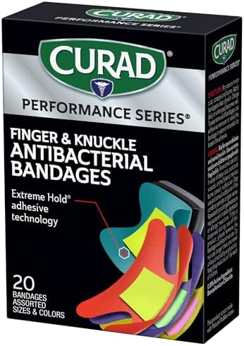Curad heavy duty flexible fabric bandages showing the specialized knuckle and fingertip shapes for active wear