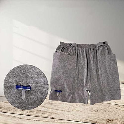 HUKSOSE medical underwear waistband showing the button strap for securing catheter tubes.