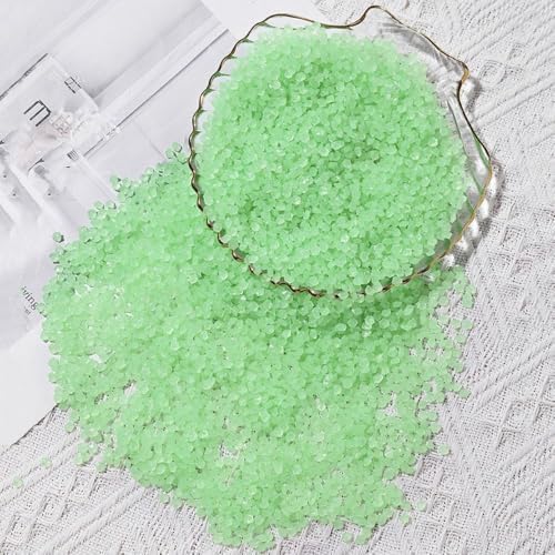 Package of colourful resin luminous stones for decor