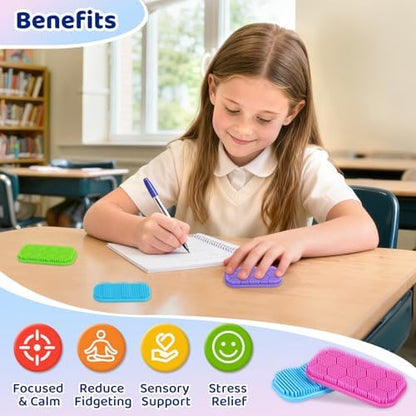 Soft bristle sensory stickers being rubbed on a school desk