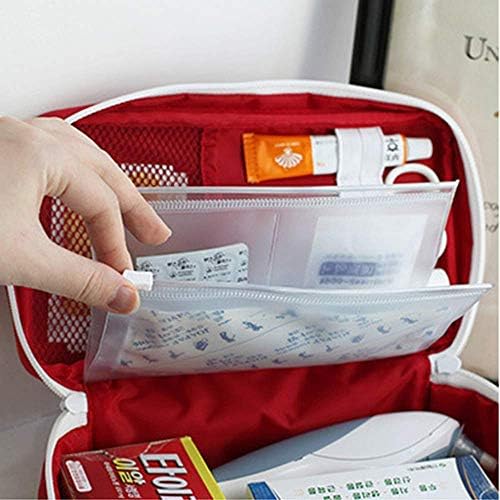 Internal pockets of red first aid kit bag showing mesh dividers