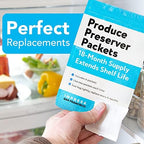 Lifestyle view of Impresa produce sachets placed inside a refrigerator crisper with fresh vegetables.