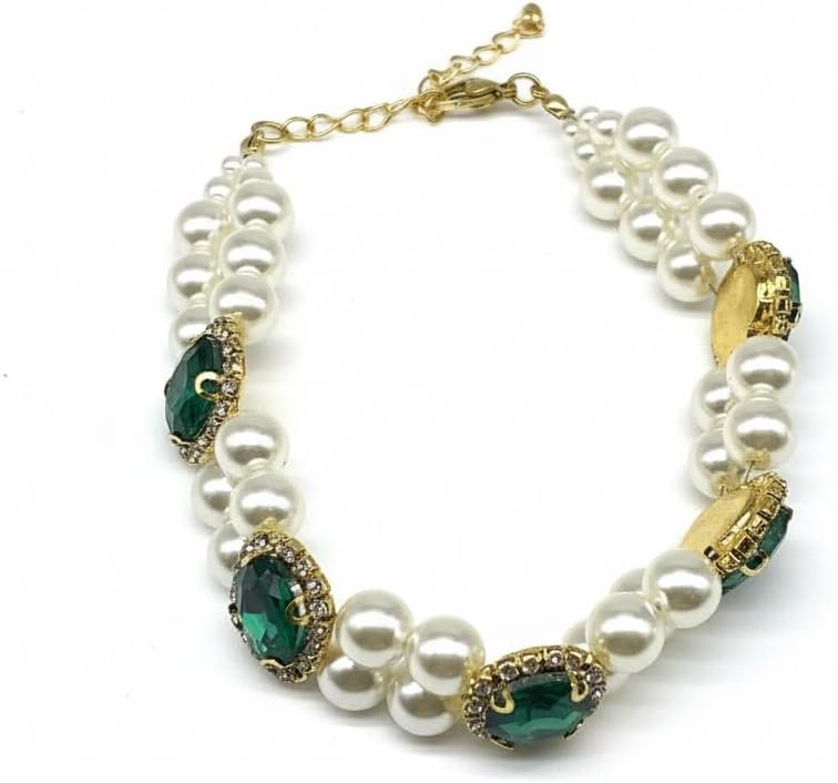 Hotlion adjustable pearl dog collar with rhinestone setting worn by a small white puppy.